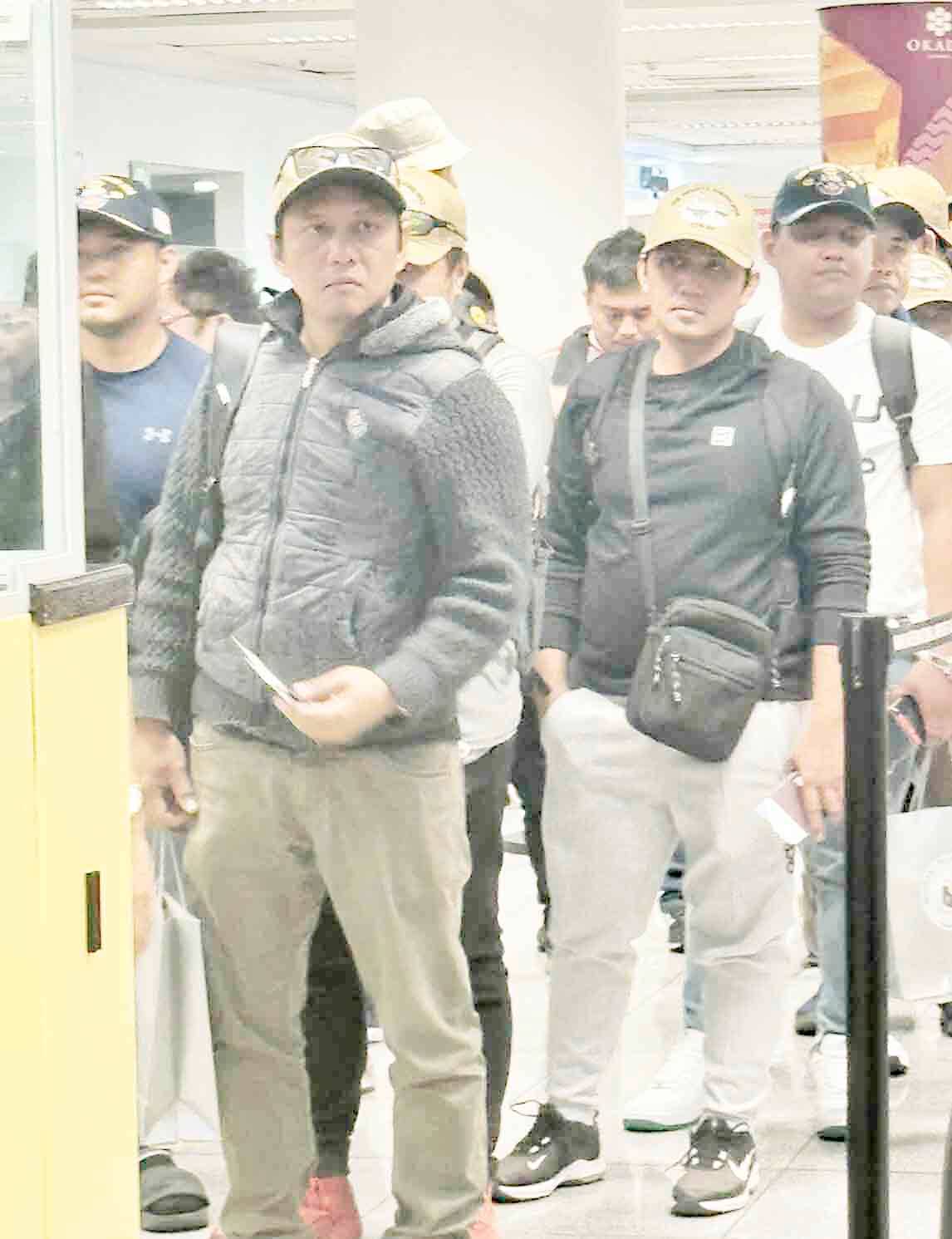 Filipino seafarers who were rescued from a missile attack by Houthi rebels in Gulf of Aden arrive.